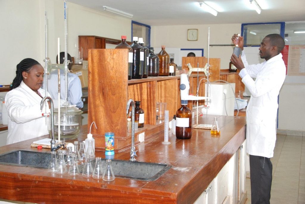 Staff conducting tests at Kabete Treatment Laboratory