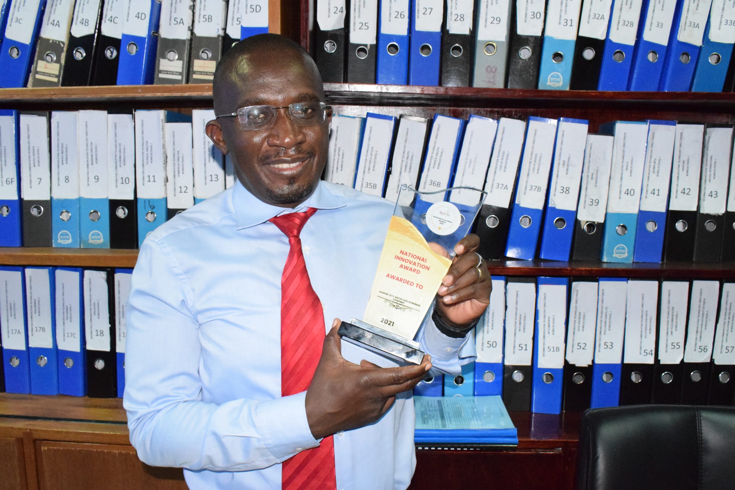 Information, Communication and Technology (ICT) Director, Martin Nang'ole is all smiles displaying National Innovation Award won by NCWSC during this year’s awards presented by Kenya National Innovation Agency (KENIA). The awards stimulates and encourages innovation in national priority areas